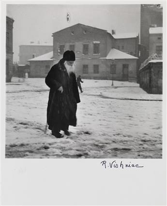 ROMAN VISHNIAC (1897-1990) A group of 9 street photographs, both larger scenes and portraits, depicting Jewish life in Poland.